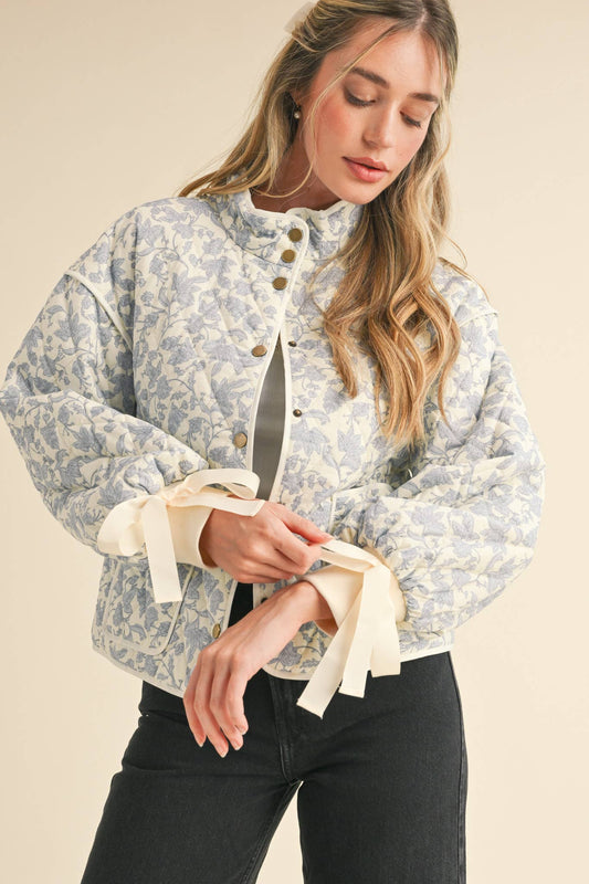 FLORAL QUILTED JACKET WITH RIBBON DETAIL