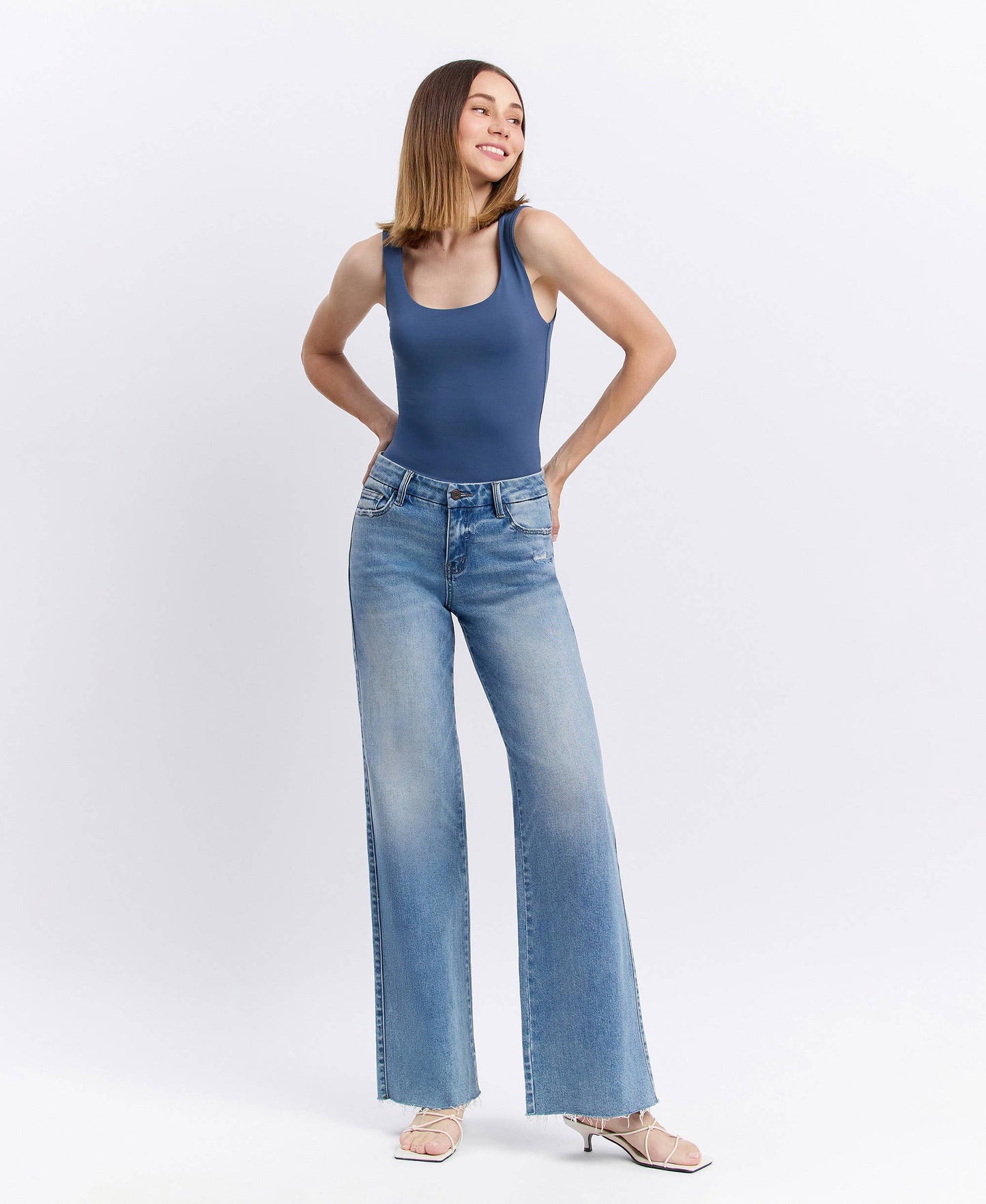 CAROLINA MID RISE CLEAN CUT RAW HEM WIDE JEANS