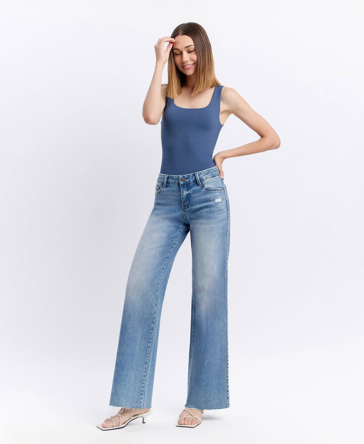CAROLINA MID RISE CLEAN CUT RAW HEM WIDE JEANS